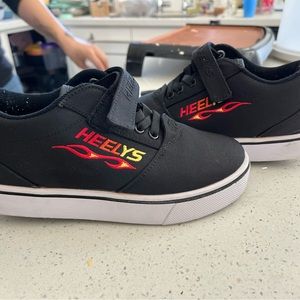 Heelys worn once. Sat in closet. Size 2Y